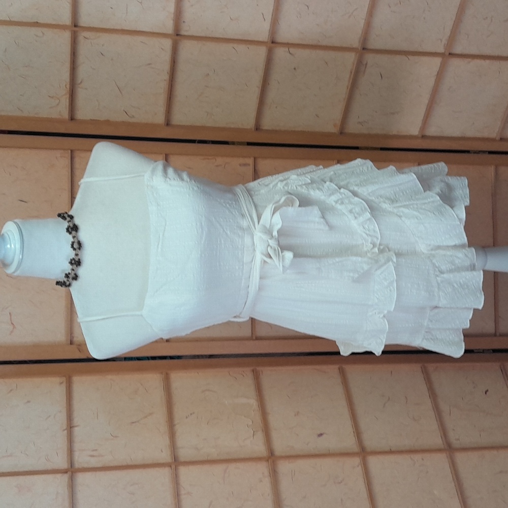 Princess Polly white ruffled dress size 6